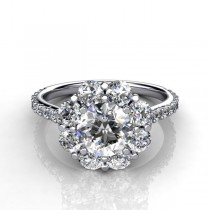 floral designed ring with a round brilliant criss cut center stone surrounded with smaller round diamonds